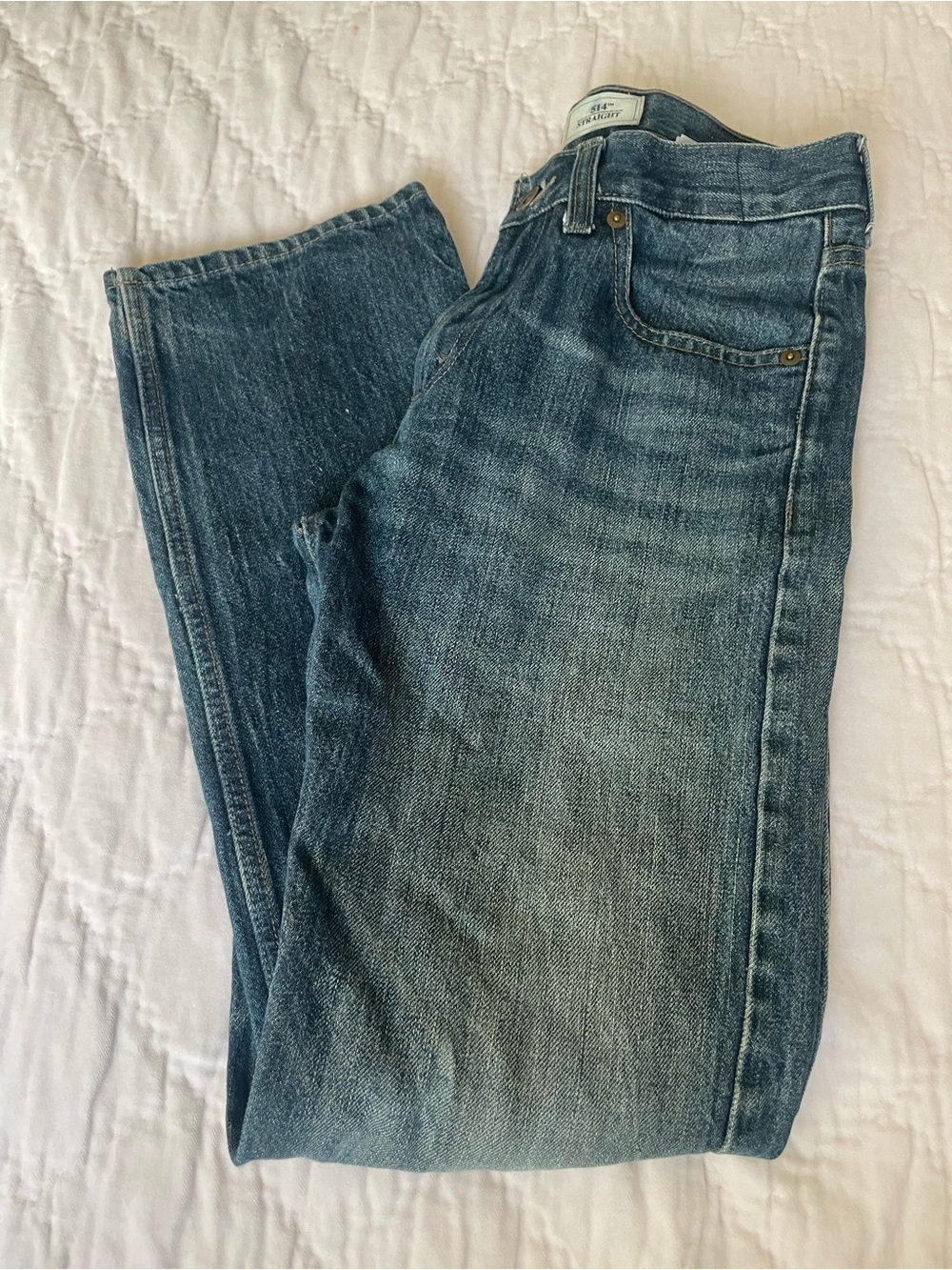 Levi's Men's Straight-Leg Denim Jeans in Faded Blue; 28” inseam.